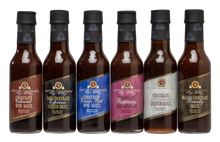 Load image into Gallery viewer, Assortment of 6 mini 5oz bottles of Chocolate sauces for a case of 12