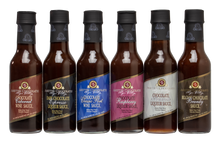 Load image into Gallery viewer, Assortment of 6 mini 5oz bottles of Chocolate sauces for a case of 12
