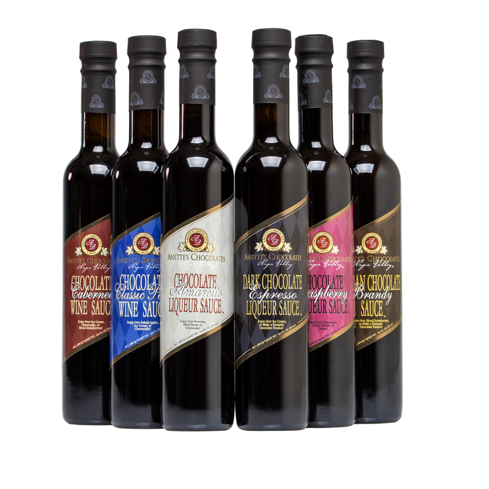 Assortment of 6 Tall bottles of Chocolate sauces